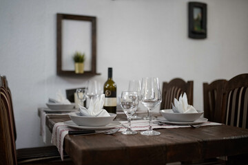 Empty table set for dinner