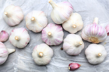 Fresh garlic on grey background