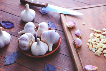 Composition with fresh garlic on table