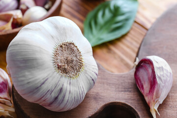 Fresh garlic on wooden background, closeup