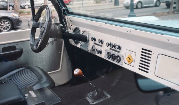 Looking inside a vintage jeep.