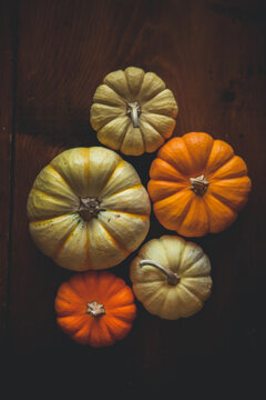pumpkins on wood