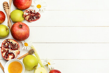 Composition for Rosh Hashanah (Jewish New Year) on white wooden background