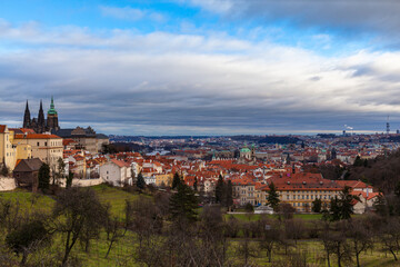 Naklejka na ściany i meble Panorama aerial view of Prague cityscape and skyline with Prague Castle and St. Vitus Cathedral in Mala Strana old town from Petrin Hill on the day with blue sky cloud, Czech Republic.