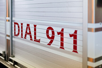 Dial 911 on back of fire truck