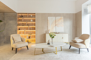 modern interior design of the living area in the studio apartment in warm soft colors. decorative...