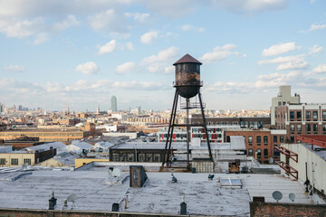 Iconic Water Tower in View from a Williamsburg, Brooklyn Rooftop in New York