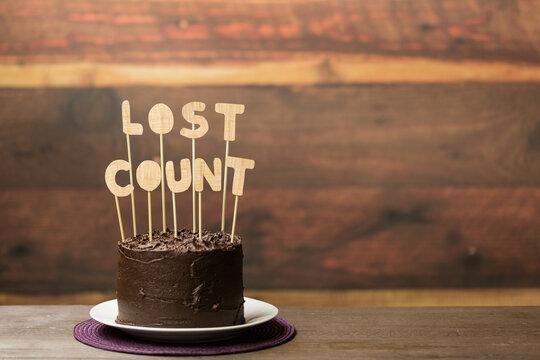 Chocolate birthday cake with ""Lost Count""