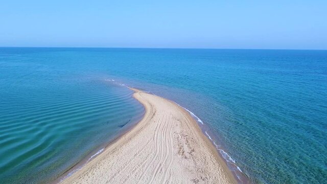 Lon exotic sandbank beach and turquoise tranquil topic sea. Aerial view 