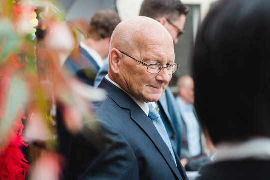 Candit shot of a man wearing glasses