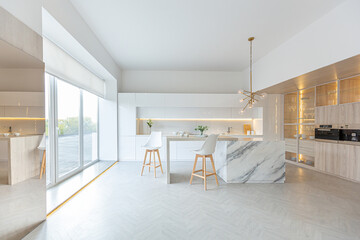 luxury interior design of modern trendy snow white kitchen in minimalistic style with island and two bar stools. huge windows to the floor and a glass rack for dishes