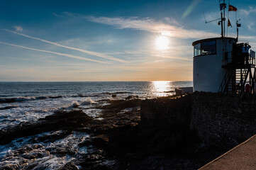 Beautiful Sunset on Welsh landscape , Porthcawl harbour with the watch tower.