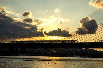 Istanbul's subway bridge in silhouette,sunset time