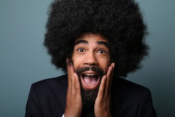 Beautiful afro man in front of a background