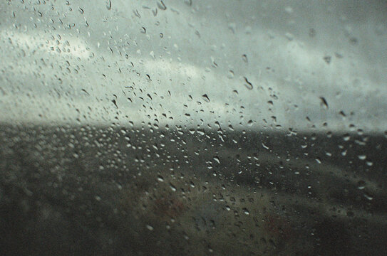 view out a ferry window on a stormy day