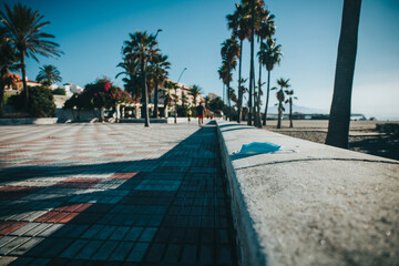 Medical face mask in the street.