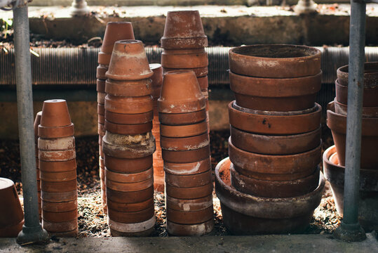 Stacked small terracotta pot collection