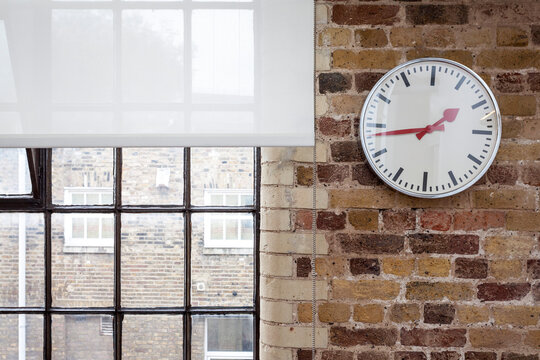 Wall clock and brick work