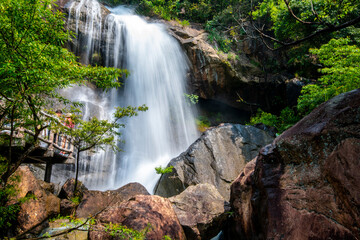 Fototapeta na wymiar Waterfalls in baishuizhai scenic spot, Guangzhou, China