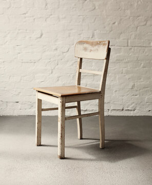 Empty vintage chair in a loft .