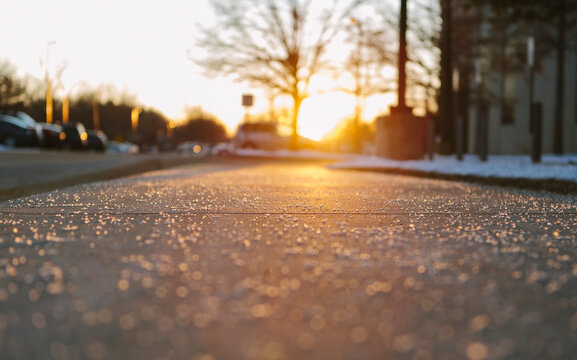 Melting Salt on Sidewalk in Winter