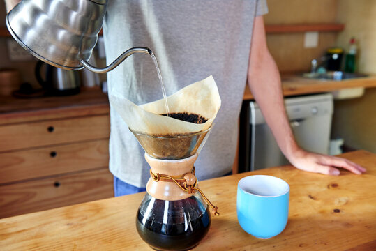 Man preparing morning coffee