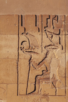 Ancient Egyptian wall carvings on a tomb outside of Cairo