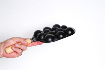 Takoyaki pan for fire use.