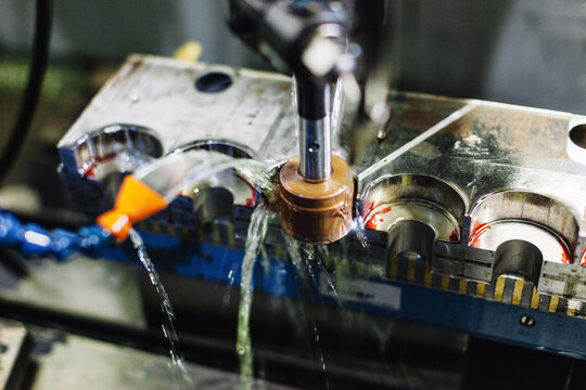 Closeup of a mold machine in a factory.