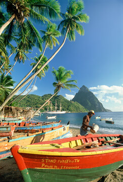 Fishing boats at Soufriere with the Pitons, St. Lucia, Windward Islands, Caribbean
