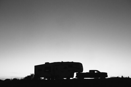 Silhouette of Truck pulling Trailor