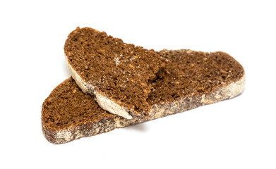 Black rye bread isolated on a white background.