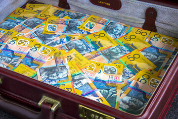 Briefcase full of Australian fifty dollar notes.