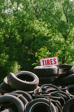 Pile of worn used automobile and bicycle tires at the dump