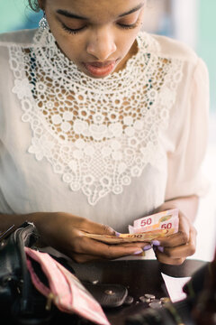 Woman paying at an establishment