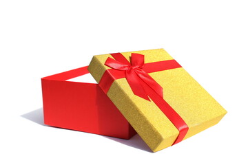 Open gift box lies on a white background