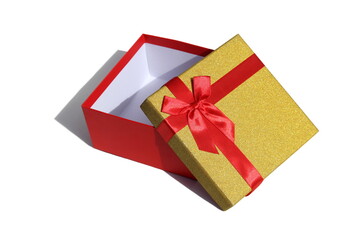 Open gift box lies on a white background
