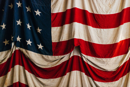 Horizontal image of a large vintage American flag
