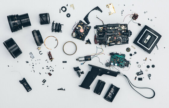 Super 8 movie camera stripped down in parts.