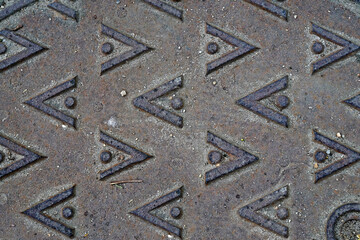Metallic surface with triangles