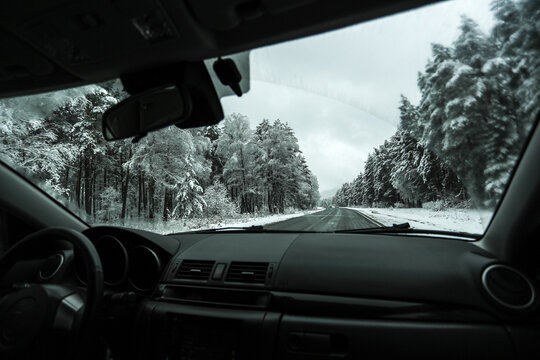 Inside view of car on winter road trip
