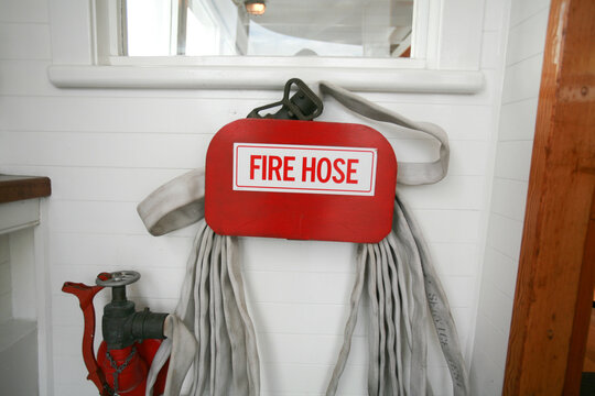 Fire hose on rack
