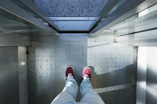 Elevator, doors, opening, red sneakers, footsie, personal perspective