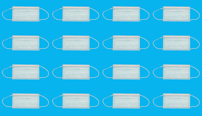 Repeating Disposable face mask pattern isolated on a blue background 