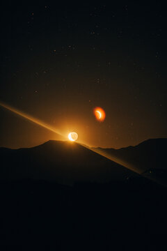 An epic moonrise over the mountains