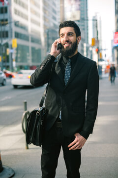 Young Hip Businessman in Suit on Phone