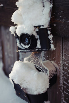 Vintage camera in snow