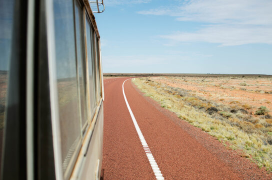Bus driving along outback road