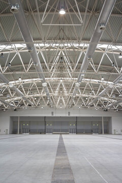 Empty white warehouse interior