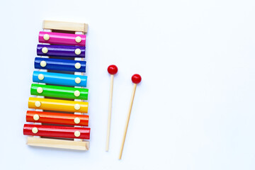 Colorful xylophone on white background.
